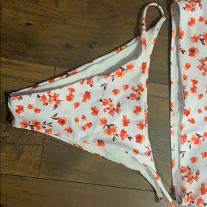 orange flowered bikini.